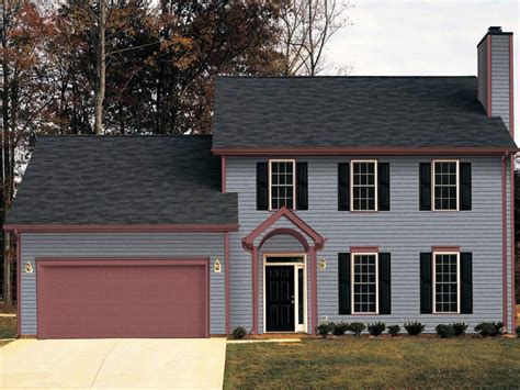 gray house with gray metal roof|gray siding black windows.